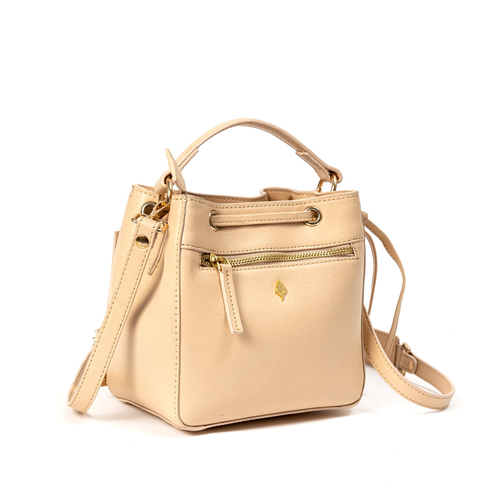 Nora Vegan Leather Embroidered Sling Bag - Almond at Kamakhyaa by Green Hermitage. This item is A Walk in the Forest by Green Hermitage, Banana Leather, Sling Bags, Tan, Under $50