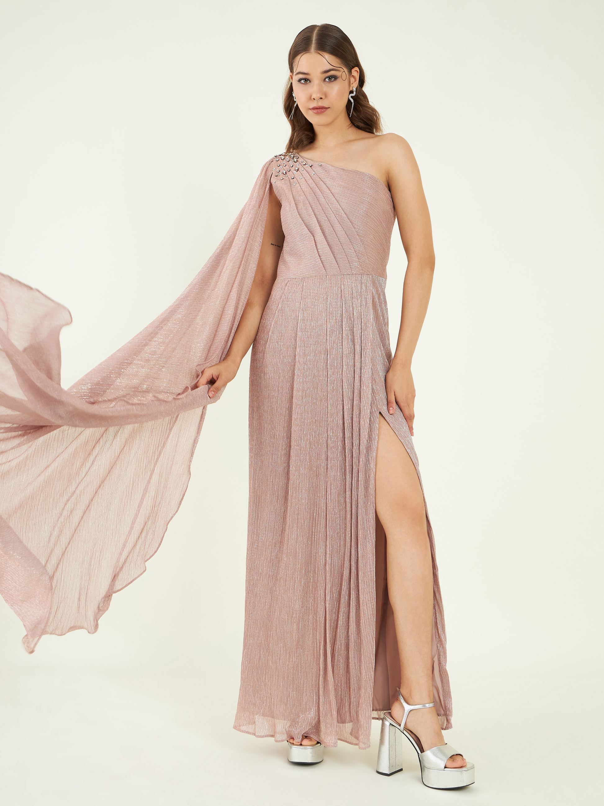 Nude One Shoulder Slit Dress at Kamakhyaa by Bohobi. This item is Brown, Fine Pleated Crepe, One Shoulder Dresses, Party Wear, Regular Fit, Swarovski Embroidery, Toxin free