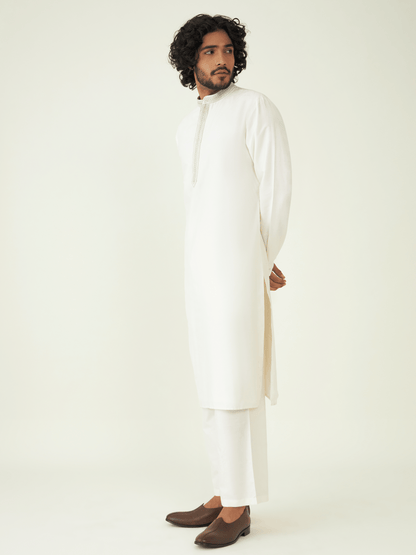 Off White Silk Kurta Set at Kamakhyaa by RoohbyRidhimaa. This item is Festive Wear, Kurta Pant Sets, Men Kurta Pant Sets, Menswear By RoohbyRidhimaa, Off white, Qala By RoohbyRidhimaa, Regular Fit, Solids, Viscose Raw Silk