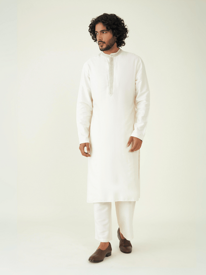 Off White Silk Kurta Set at Kamakhyaa by RoohbyRidhimaa. This item is Festive Wear, Kurta Pant Sets, Men Kurta Pant Sets, Menswear By RoohbyRidhimaa, Off white, Qala By RoohbyRidhimaa, Regular Fit, Solids, Viscose Raw Silk