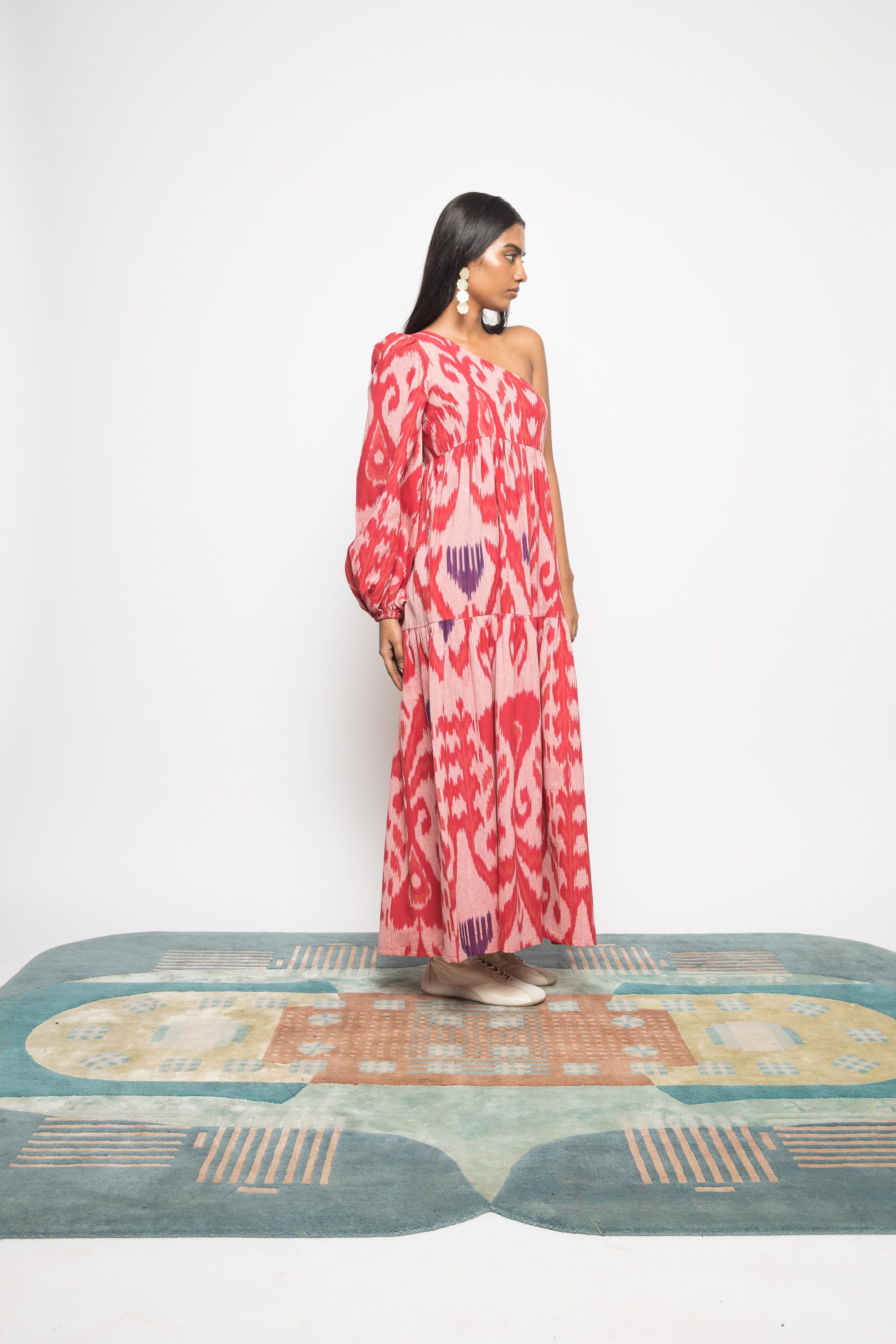 One Shoulder Tier Maxi at kamakhyaa.com by Anushé Pirani. This item is 100% Cotton, Beach Wear, Brunch Wear, Casual Wear, Console Collection List, Cotton, Fresh Ink by Anushe Pirani, Handwoven cotton, Ikat Prints, Light Pink, Pink, Regular Fit, Resort Wear, Vacation Wear, Womenswear