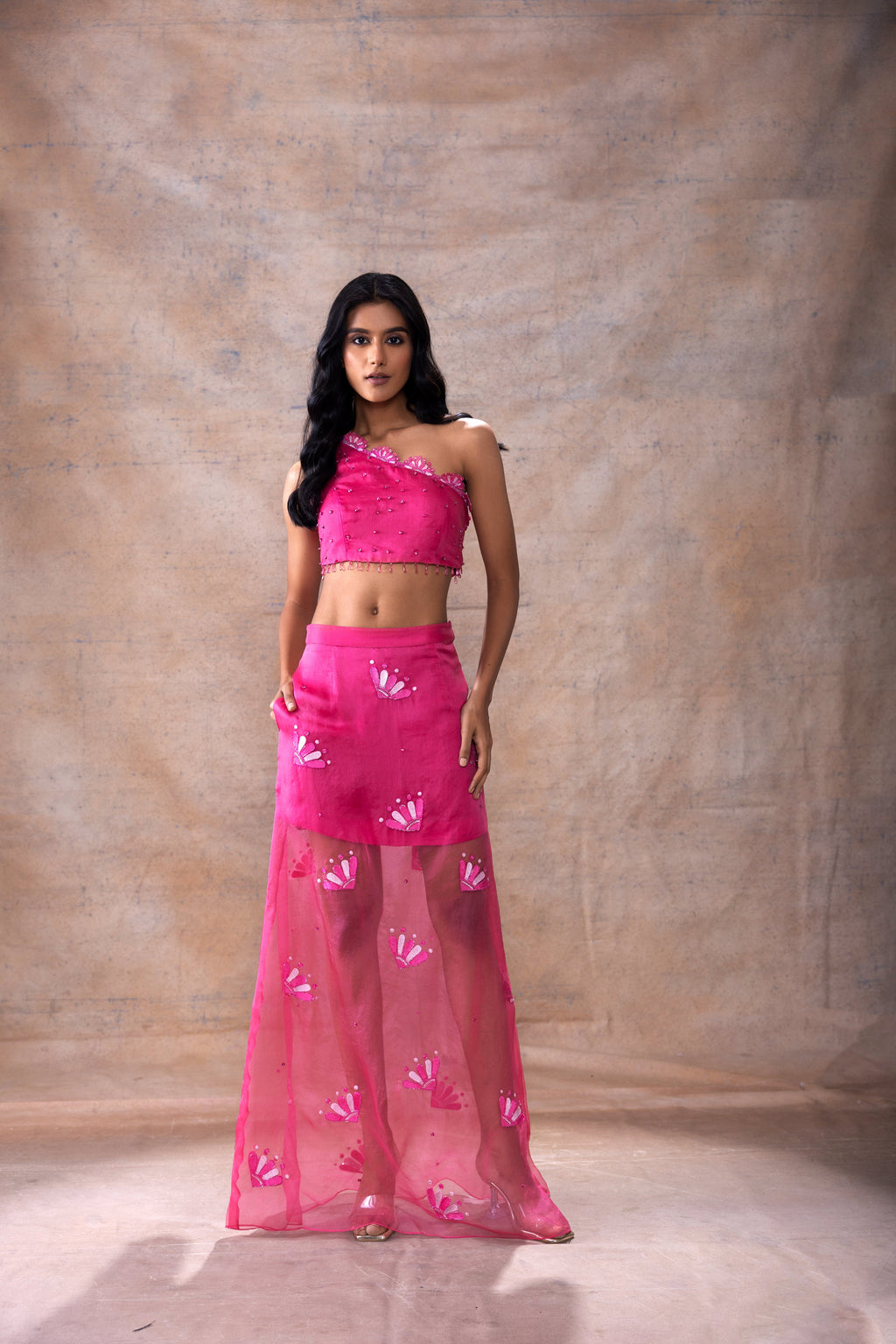 One Shoulder Top and Skirt Set at Kamakhyaa by Akashi Clothing. This item is Co-ord Sets, Festive Wear, Fusion Wear, Hand Embroidered, missing, Modal Satin, Organza, Party Wear, Party Wear Co-ord Sets, Pink, Slim Fit, Top Skirt Sets, Wedding Wear, Womenswear, Zaira by Akashi Clothing