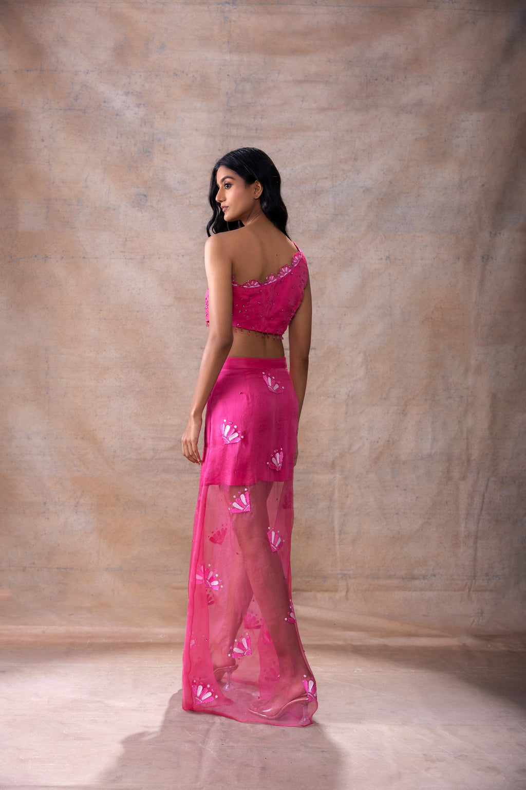 One Shoulder Top and Skirt Set at Kamakhyaa by Akashi Clothing. This item is Co-ord Sets, Festive Wear, Fusion Wear, Hand Embroidered, missing, Modal Satin, Organza, Party Wear, Party Wear Co-ord Sets, Pink, Slim Fit, Top Skirt Sets, Wedding Wear, Womenswear, Zaira by Akashi Clothing