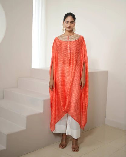 Orange Cowl Neck Bandhej Print Kurta Pant Set at Kamakhyaa by Mayura Kumar. This item is Bandhej, Bandhej Bandhini Mixology by Mayura Kumar, Dry clean, Festive Wear, Independence, Orange, Relaxed Fit, Satin Silk, Tie-Dye