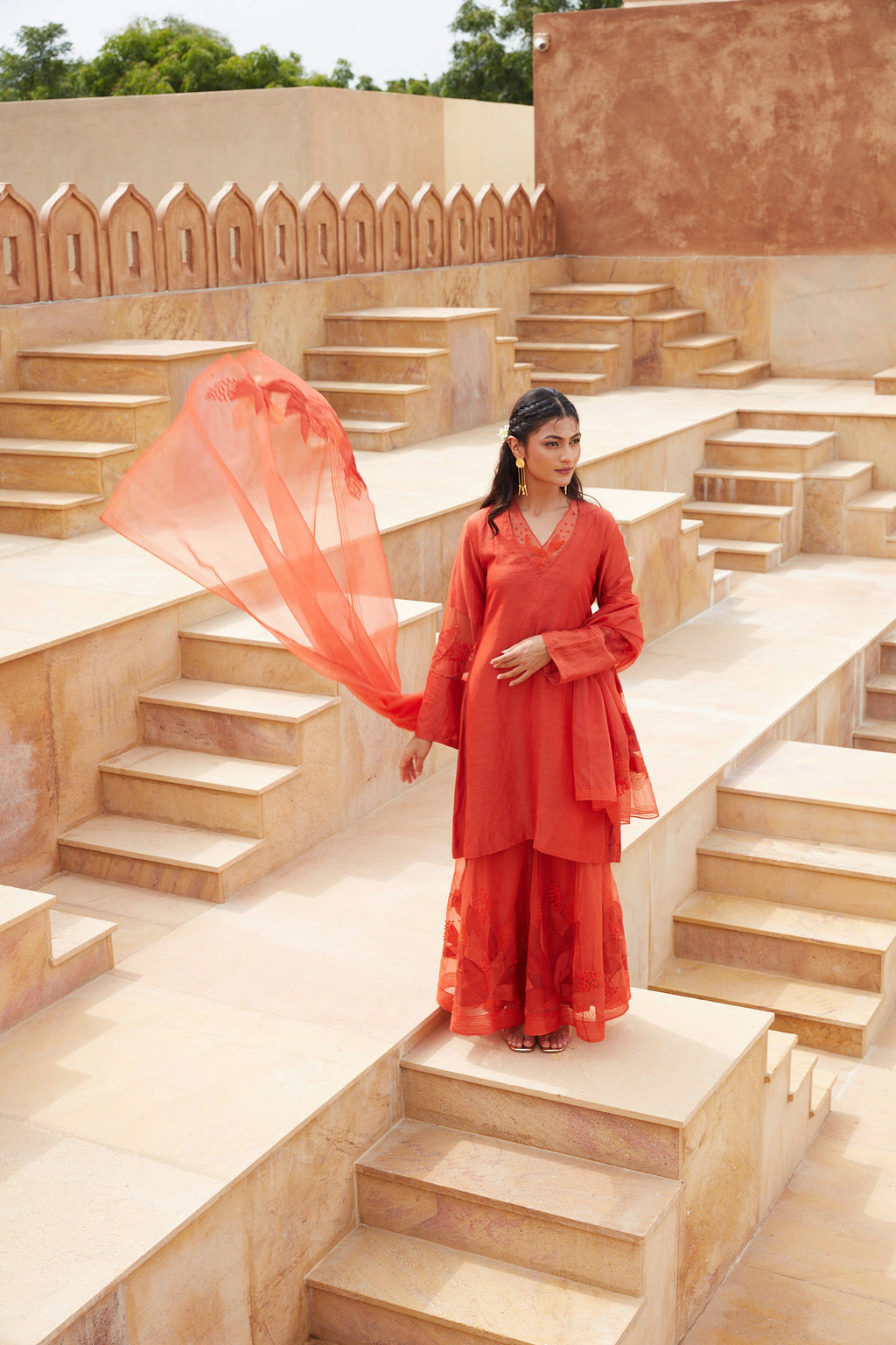 Orange Silk Organza Sharara Set at Kamakhyaa by Chambray & Co.. This item is Chambray & Co, Embroidered, Indian Wear, Natural, Orange, Party Wear, Regular Fit, Riwayat, Sharara and Gharara Sets, Silk, Womenswear