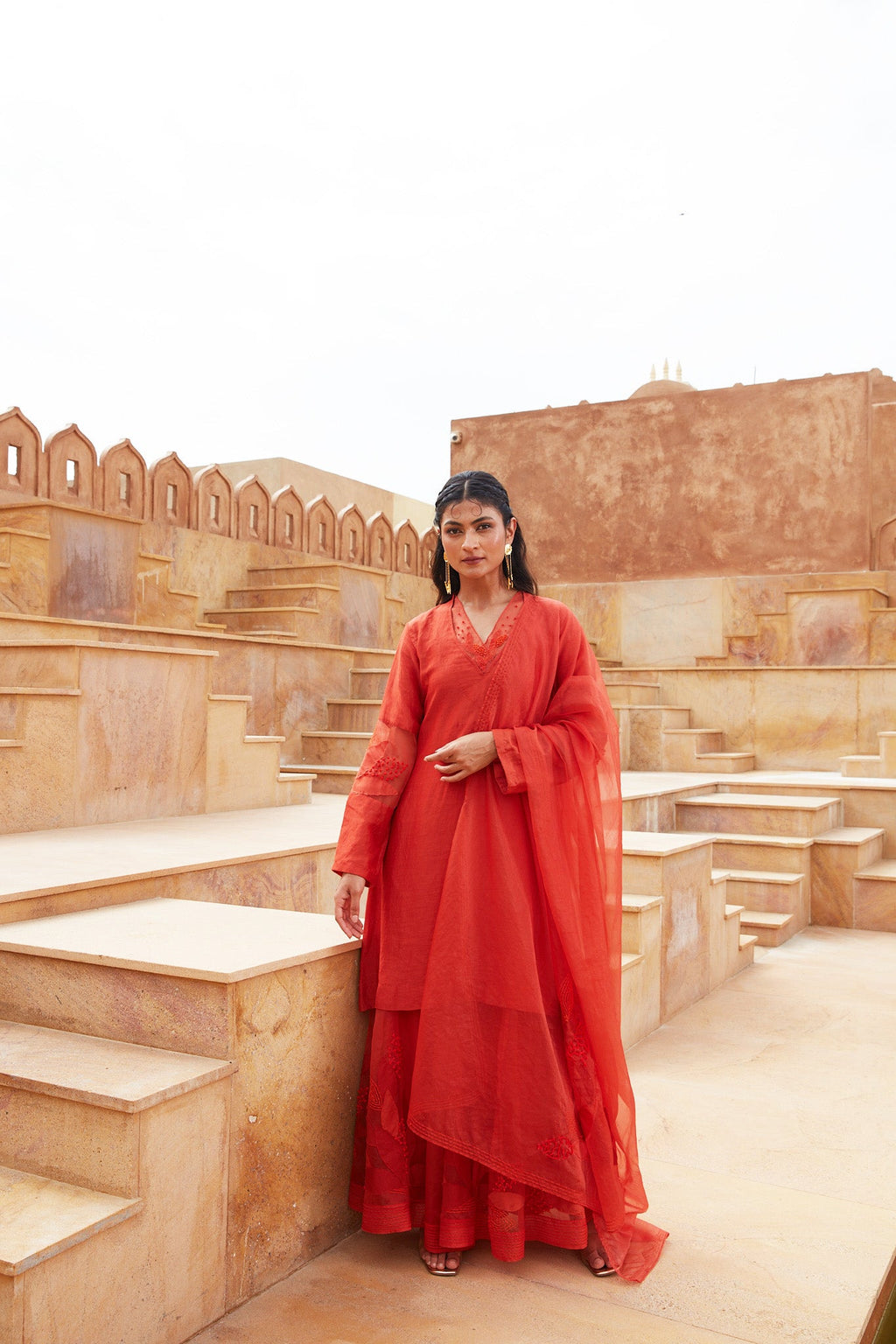 Orange Silk Organza Sharara Set at Kamakhyaa by Chambray & Co.. This item is Chambray & Co, Embroidered, Indian Wear, Natural, Orange, Party Wear, Regular Fit, Riwayat, Sharara and Gharara Sets, Silk, Womenswear