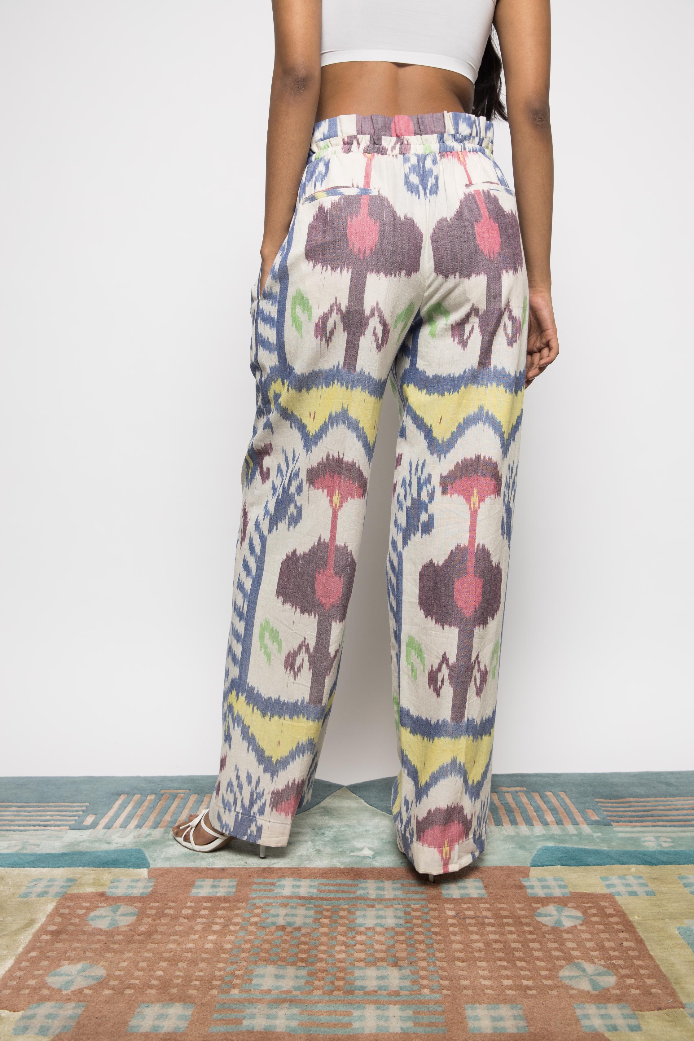 Paperbag Pants at kamakhyaa.com by Anushé Pirani. This item is 100% Cotton, Beach Wear, Brunch Wear, Casual Wear, Console Collection List, Cotton, Fresh Ink by Anushe Pirani, Handwoven cotton, Ikat Prints, Multicolor, Regular Fit, Resort Wear, Vacation Wear, Womenswear