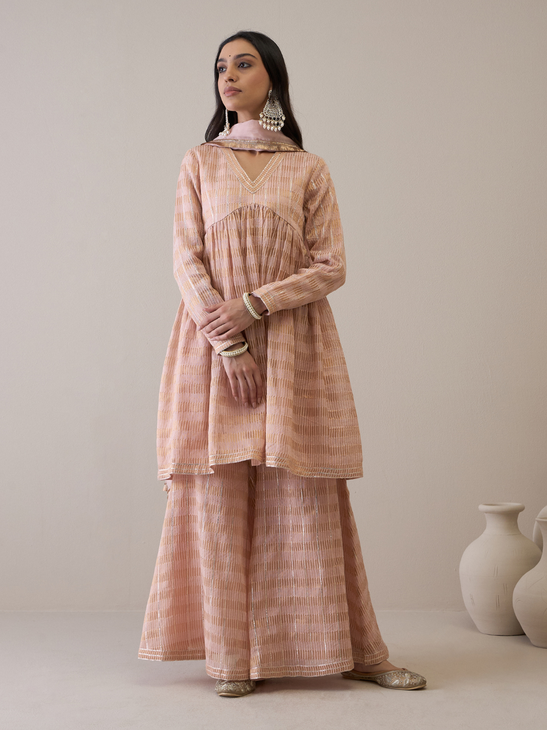 Peach Chanderi Silk Gota Embroidered Sharara Set at Kamakhyaa by RoohbyRidhimaa. This item is Avani by RoohbyRidhimaa, Chanderi Silk, Ethnic Wear, Gotta Embroidery, Pink, Relaxed Fit, Sequin Embroidered, Sharara Sets, Silk Chanderi, Silk Organza, Toxin free