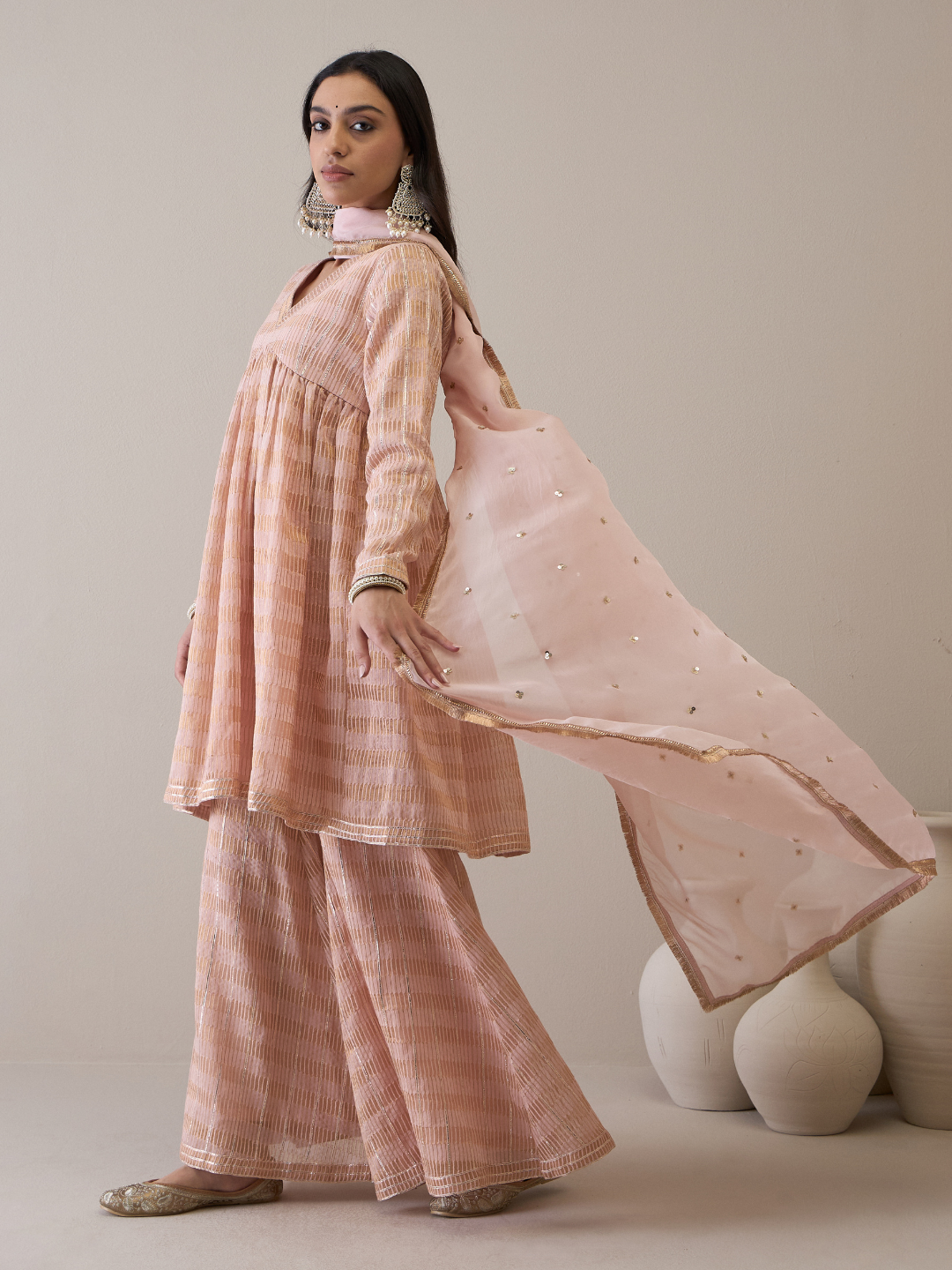 Peach Chanderi Silk Gota Embroidered Sharara Set at Kamakhyaa by RoohbyRidhimaa. This item is Avani by RoohbyRidhimaa, Chanderi Silk, Ethnic Wear, Gotta Embroidery, Pink, Relaxed Fit, Sequin Embroidered, Sharara Sets, Silk Chanderi, Silk Organza, Toxin free