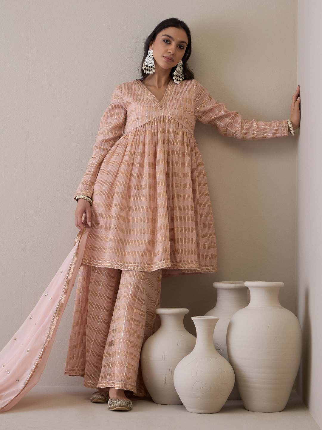 Peach Chanderi Silk Gota Embroidered Sharara Set at Kamakhyaa by RoohbyRidhimaa. This item is Avani by RoohbyRidhimaa, Chanderi Silk, Ethnic Wear, Gotta Embroidery, Pink, Relaxed Fit, Sequin Embroidered, Sharara Sets, Silk Chanderi, Silk Organza, Toxin free