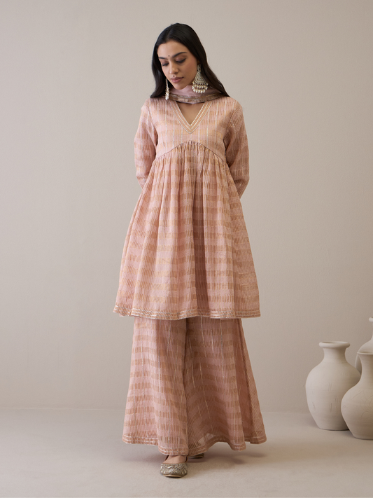 Peach Chanderi Silk Gota Embroidered Sharara Set at Kamakhyaa by RoohbyRidhimaa. This item is Avani by RoohbyRidhimaa, Chanderi Silk, Ethnic Wear, Gotta Embroidery, Pink, Relaxed Fit, Sequin Embroidered, Sharara Sets, Silk Chanderi, Silk Organza, Toxin free