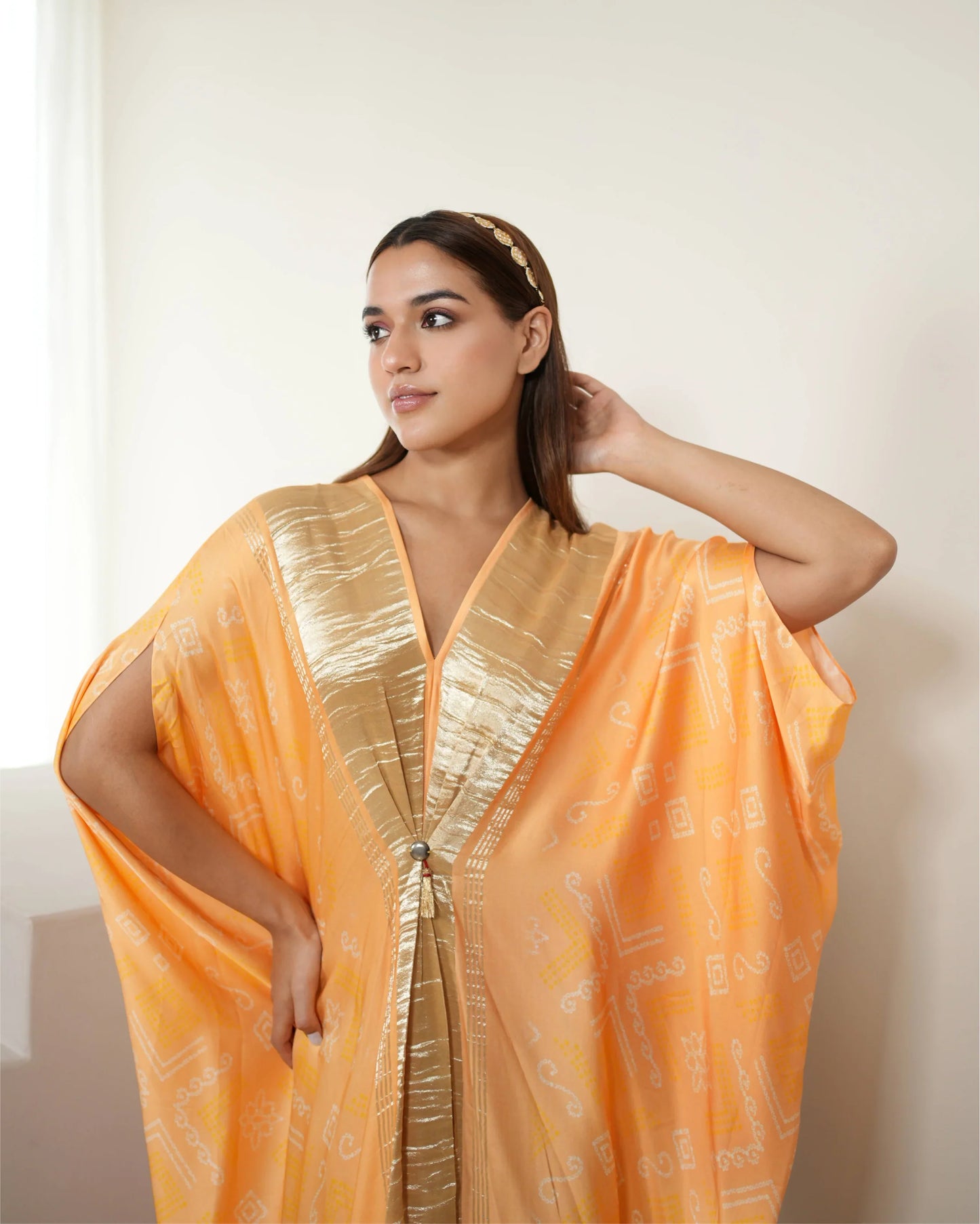 Peach Zari Weave Free Size Kaftan at Kamakhyaa by Mayura Kumar. This item is Bandhej, Bandhej Bandhini Mixology by Mayura Kumar, Dry clean, Festive Wear, Modal Satin Silk, Pink, Relaxed Fit, Satin Silk, Silk, Tie-Dye