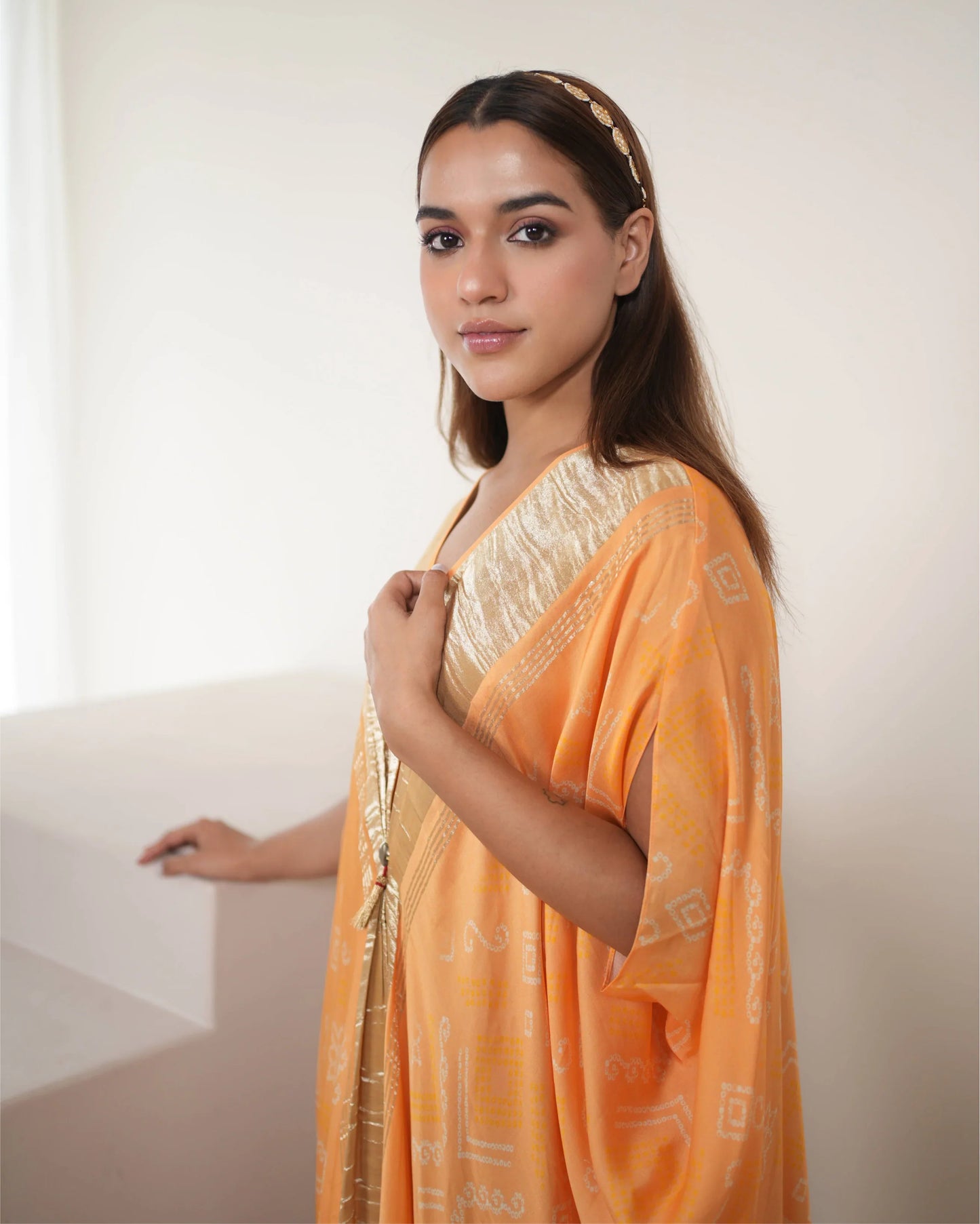 Peach Zari Weave Free Size Kaftan at Kamakhyaa by Mayura Kumar. This item is Bandhej, Bandhej Bandhini Mixology by Mayura Kumar, Dry clean, Festive Wear, Modal Satin Silk, Pink, Relaxed Fit, Satin Silk, Silk, Tie-Dye