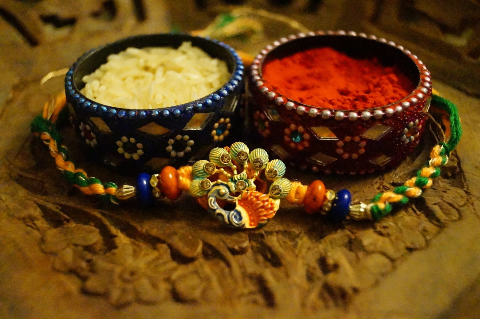 Peacock Stone and Colorful Stone Thread Rakhi at Kamakhyaa by Kamakhyaa. This item is jewelry, Multicolor, Natural, Rakhi, Under 1500, Under 1750, Upcycled