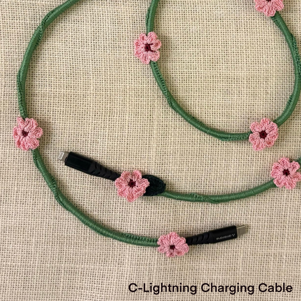 Pink Daisy Crochet Charging Cord C-Lightening Cable at Kamakhyaa by Ikriit'm. This item is Bloom by Ikriit'm, Crochet, Relaxed Fit, Under $50