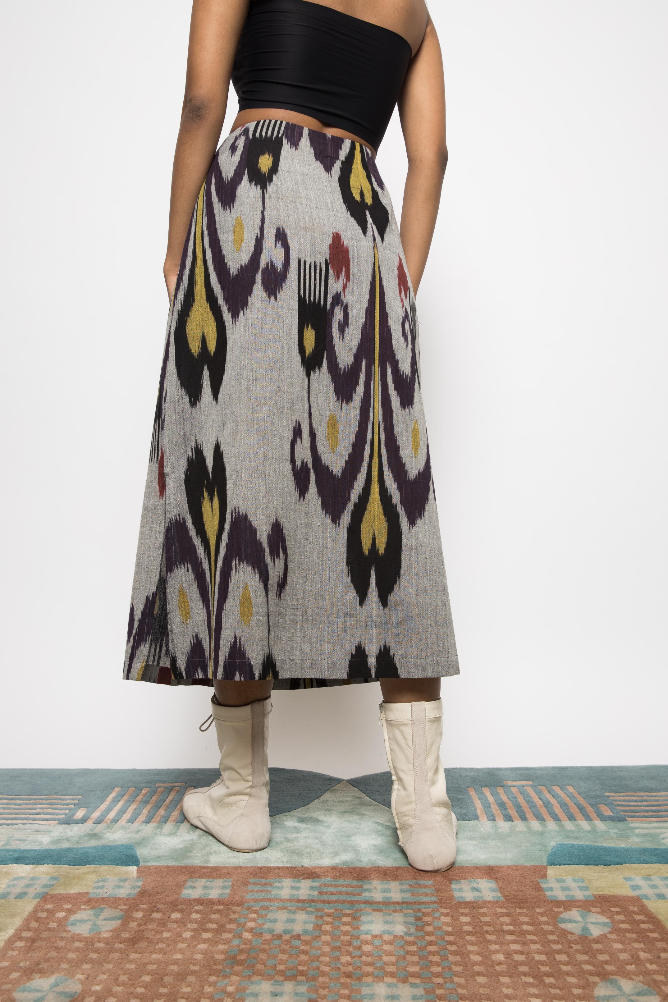 Pleated Midi Skirt at kamakhyaa.com by Anushé Pirani. This item is 100% Cotton, Beach Wear, Brunch Wear, Casual Wear, Console Collection List, Cotton, Fresh Ink by Anushe Pirani, Grey, Handwoven cotton, Ikat Prints, Regular Fit, Resort Wear, Vacation Wear, Womenswear