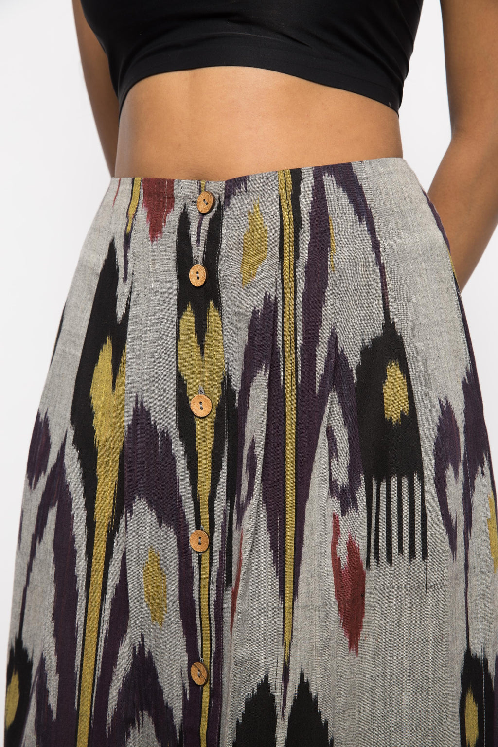 Pleated Midi Skirt at kamakhyaa.com by Anushé Pirani. This item is 100% Cotton, Beach Wear, Brunch Wear, Casual Wear, Console Collection List, Cotton, Fresh Ink by Anushe Pirani, Grey, Handwoven cotton, Ikat Prints, Regular Fit, Resort Wear, Vacation Wear, Womenswear