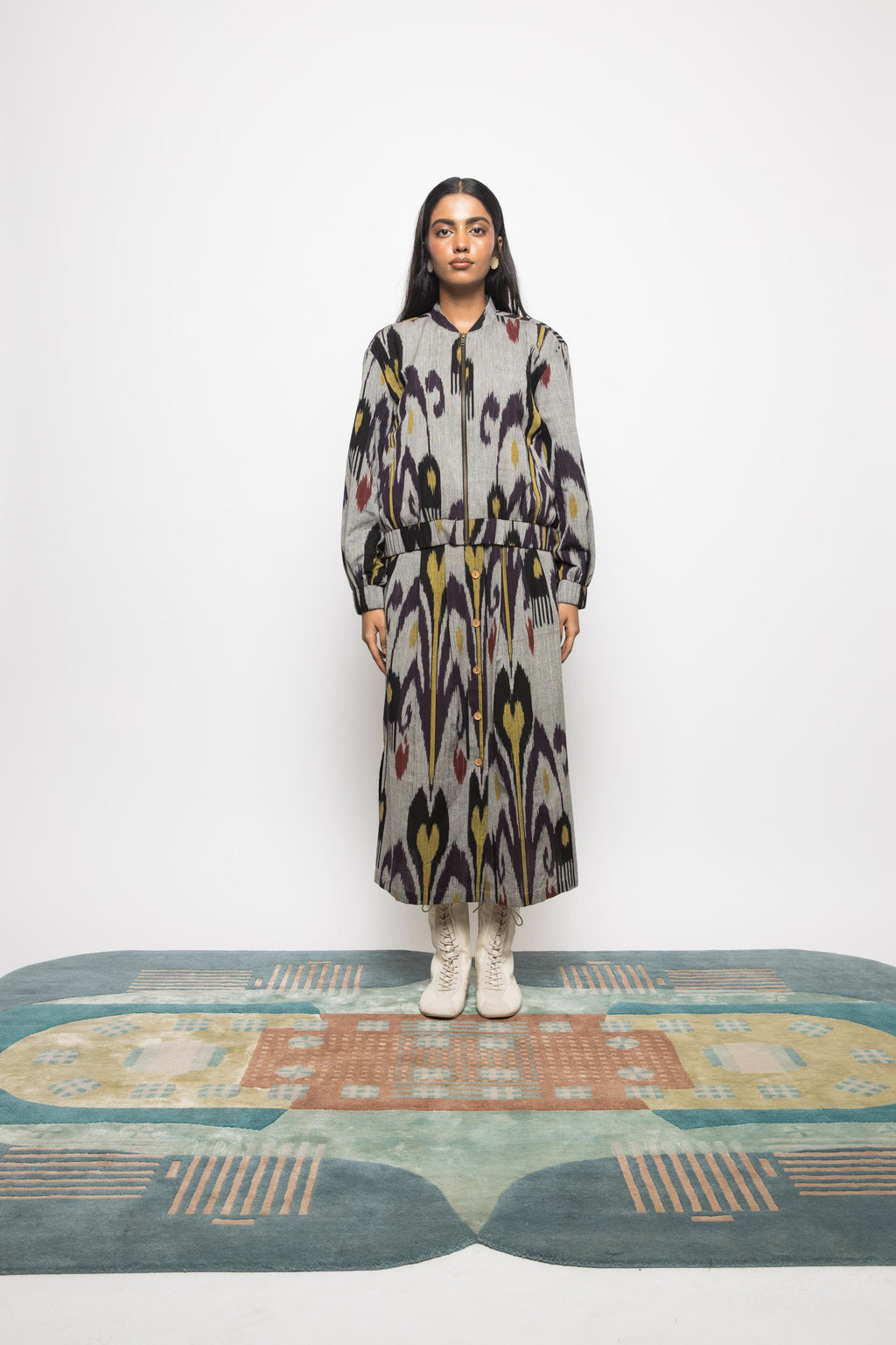 Pleated Midi Skirt at kamakhyaa.com by Anushé Pirani. This item is 100% Cotton, Beach Wear, Brunch Wear, Casual Wear, Console Collection List, Cotton, Fresh Ink by Anushe Pirani, Grey, Handwoven cotton, Ikat Prints, Regular Fit, Resort Wear, Vacation Wear, Womenswear