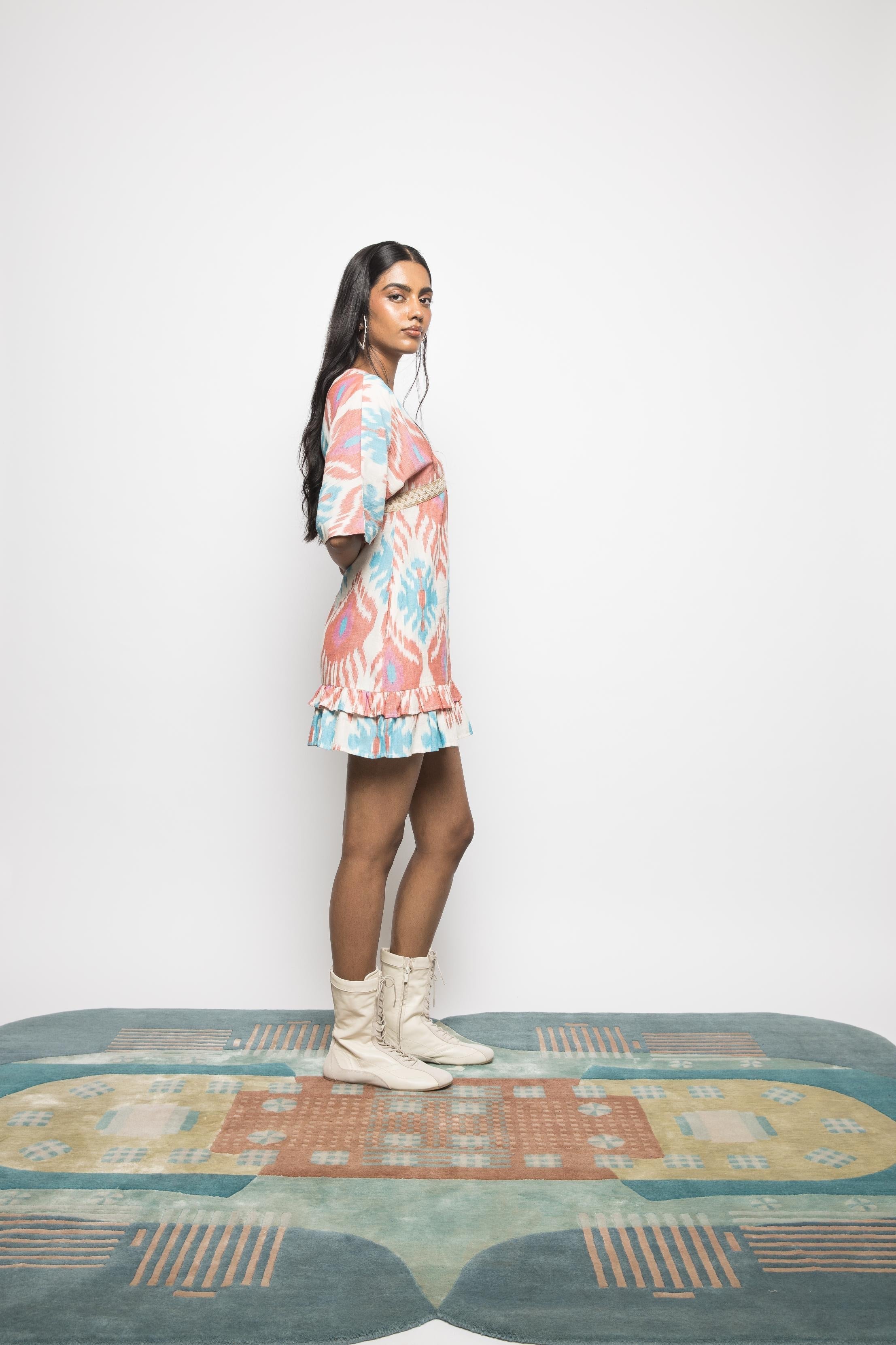 Plunge Neck Ruffle Mini at kamakhyaa.com by Anushé Pirani. This item is 100% Cotton, Beach Wear, Brunch Wear, Casual Wear, Console Collection List, Cotton, Fresh Ink by Anushe Pirani, Handwoven cotton, Ikat Prints, Multicolor, Party Wear, Regular Fit, Resort Wear, Vacation Wear, Womenswear