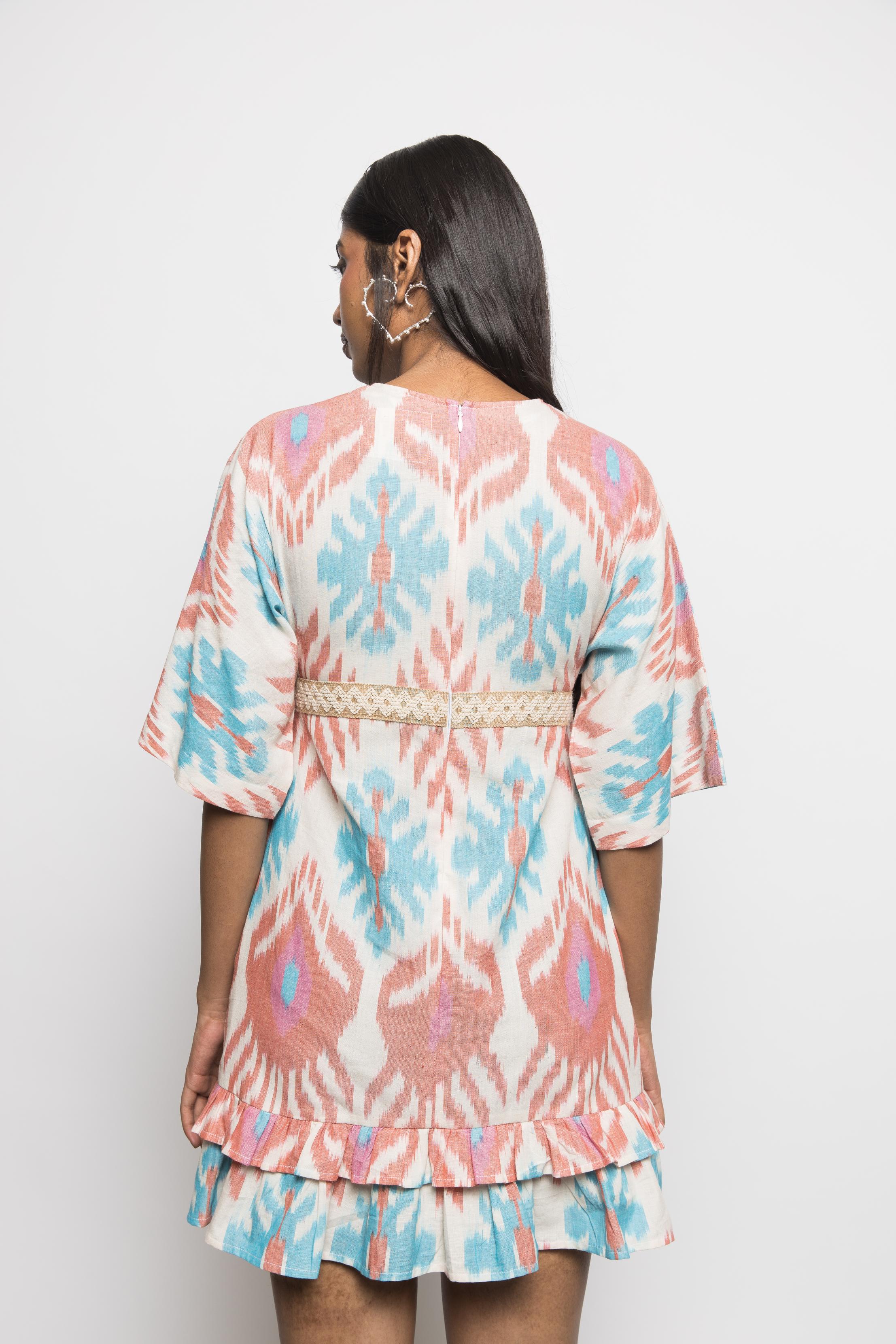 Plunge Neck Ruffle Mini at kamakhyaa.com by Anushé Pirani. This item is 100% Cotton, Beach Wear, Brunch Wear, Casual Wear, Console Collection List, Cotton, Fresh Ink by Anushe Pirani, Handwoven cotton, Ikat Prints, Multicolor, Party Wear, Regular Fit, Resort Wear, Vacation Wear, Womenswear