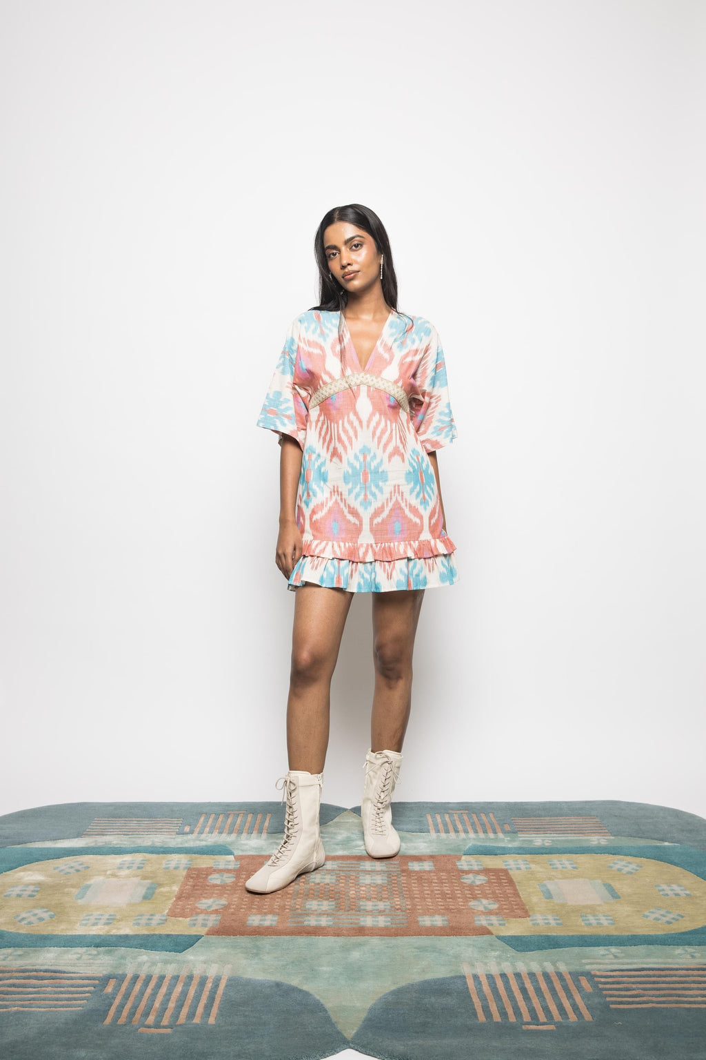 Plunge Neck Ruffle Mini at kamakhyaa.com by Anushé Pirani. This item is 100% Cotton, Beach Wear, Brunch Wear, Casual Wear, Console Collection List, Cotton, Fresh Ink by Anushe Pirani, Handwoven cotton, Ikat Prints, Multicolor, Party Wear, Regular Fit, Resort Wear, Vacation Wear, Womenswear
