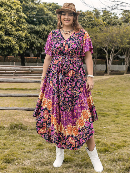 Plus Size Printed V-Neck Flutter Sleeve Midi Dress at Kamakhyaa by Trendsi. This item is H.R.Z, Ship From Overseas, Trendsi