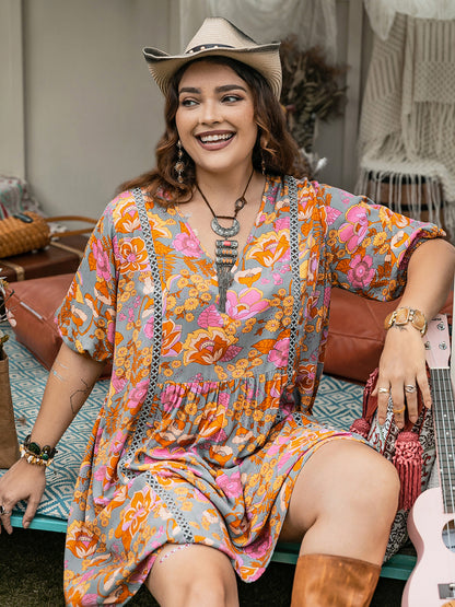 Plus Size Ruched Printed Half Sleeve Mini Dress at Kamakhyaa by Trendsi. This item is H.R.Z, Ship From Overseas, Trendsi