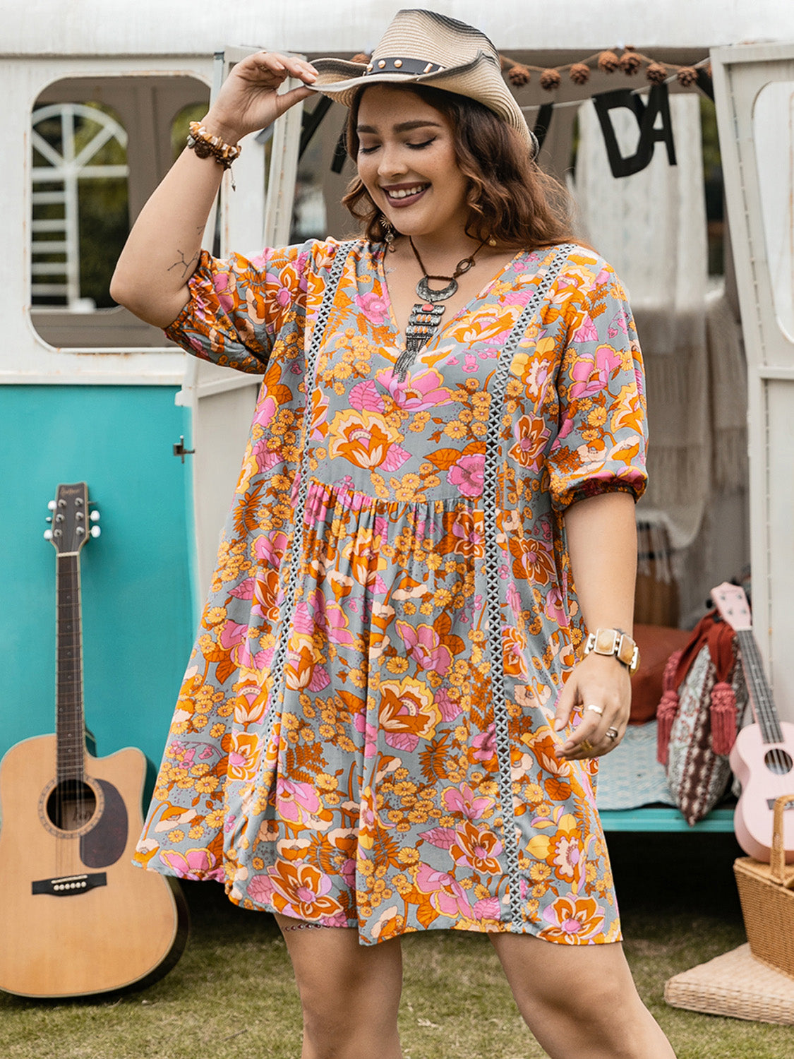 Plus Size Ruched Printed Half Sleeve Mini Dress at Kamakhyaa by Trendsi. This item is H.R.Z, Ship From Overseas, Trendsi