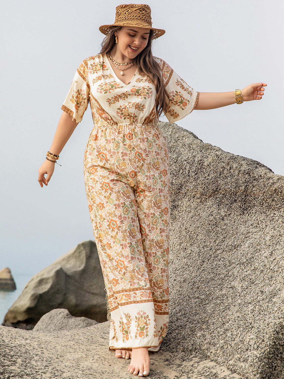 Plus Size V-Neck Flutter Sleeve Wide Leg Jumpsuit at Kamakhyaa by Trendsi. This item is H.R.Z, Ship From Overseas, Trendsi