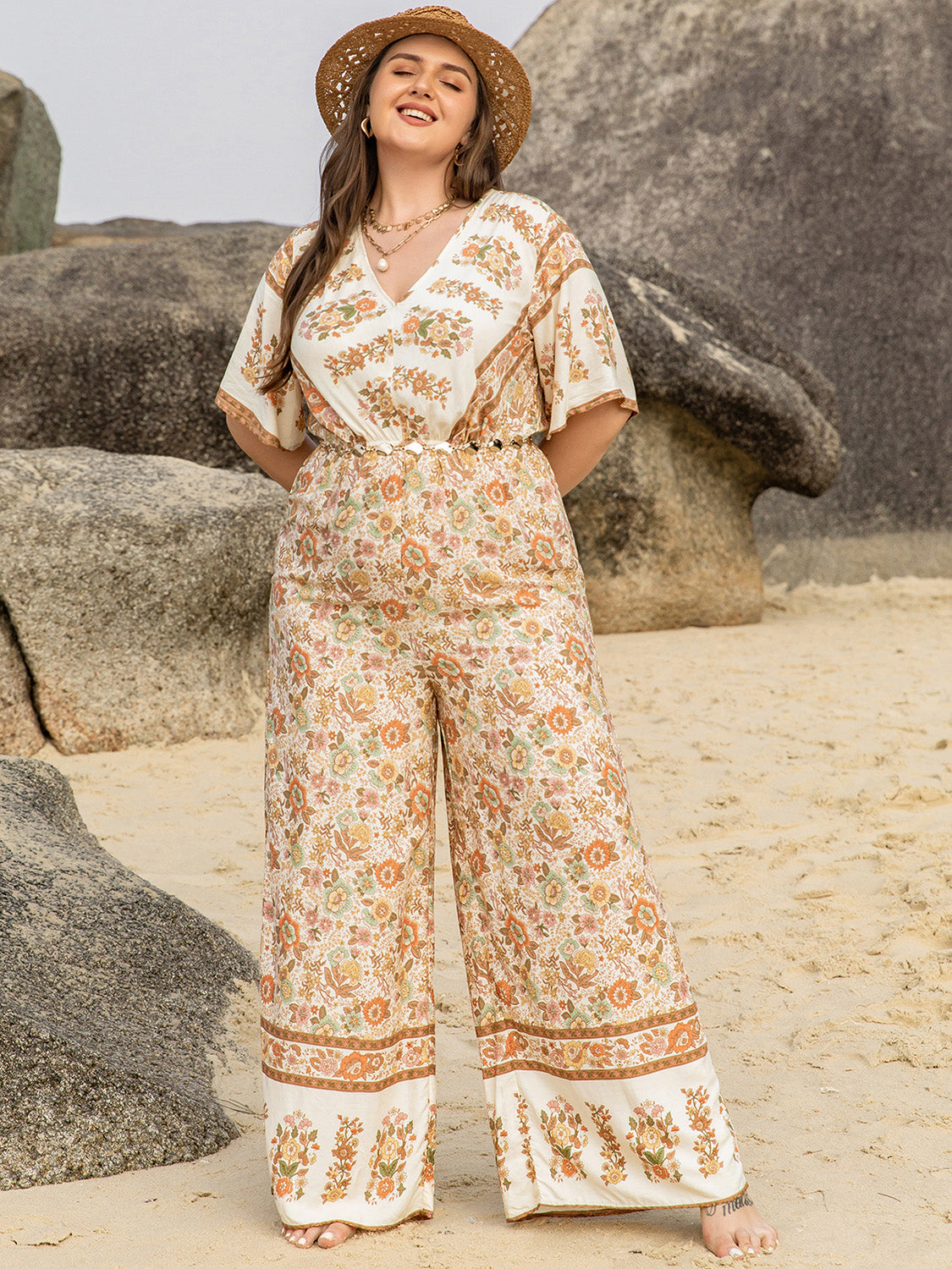 Plus Size V-Neck Flutter Sleeve Wide Leg Jumpsuit at Kamakhyaa by Trendsi. This item is H.R.Z, Ship From Overseas, Trendsi