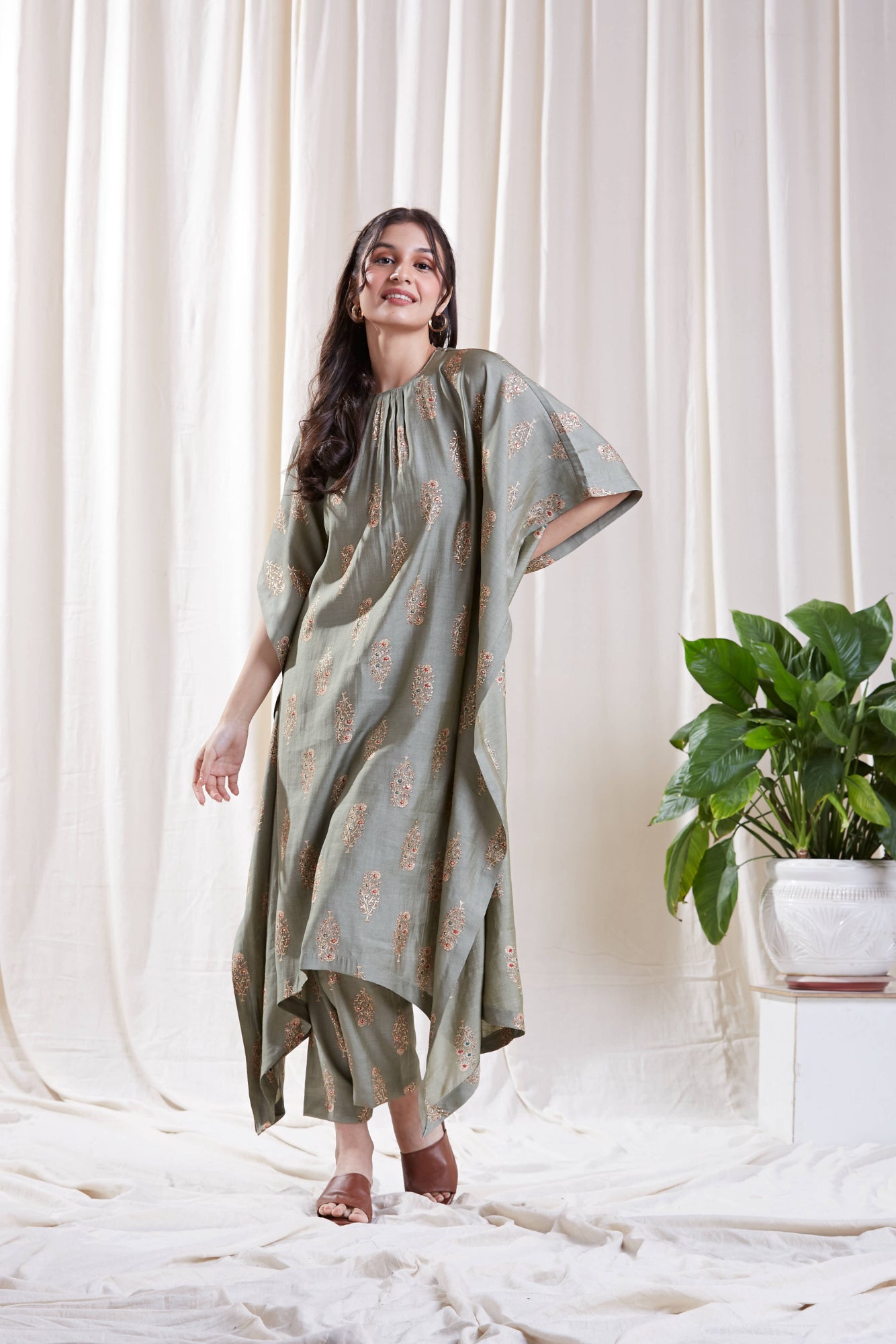 Printed Green Kaftan Set at Kamakhyaa by Hasttvam. This item is Floral, Fusion Wear, Green, Handmade by Artisans, Natural dyes, Relaxed Fit, Respondible production and Vegan, Viscose Silk