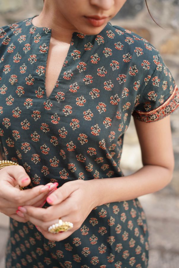 Printed Green Kurta Set with Red Dupatta at Kamakhyaa by Hasttvam. This item is CottonFloralFestive WearGreenHandmade by artisans, Natural dyes, Relaxed Fit, Respondible production and Vegan