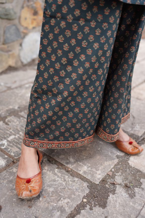 Printed Green Kurta Set with Red Dupatta at Kamakhyaa by Hasttvam. This item is CottonFloralFestive WearGreenHandmade by artisans, Natural dyes, Relaxed Fit, Respondible production and Vegan