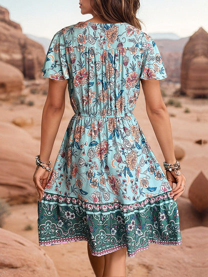 Printed V-Neck Flutter Sleeve Dress at Kamakhyaa by Trendsi. This item is Hundredth, Ship From Overseas, Trendsi