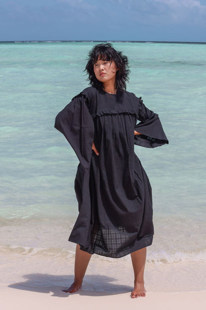 Recycled Cotton Black Solid Dress at Kamakhyaa by Raas. This item is Azo Free Dyes, Black, Cotton, Layla, Midi Dresses, Recycled, Relaxed Fit, Resort Wear, Solids, Womenswear