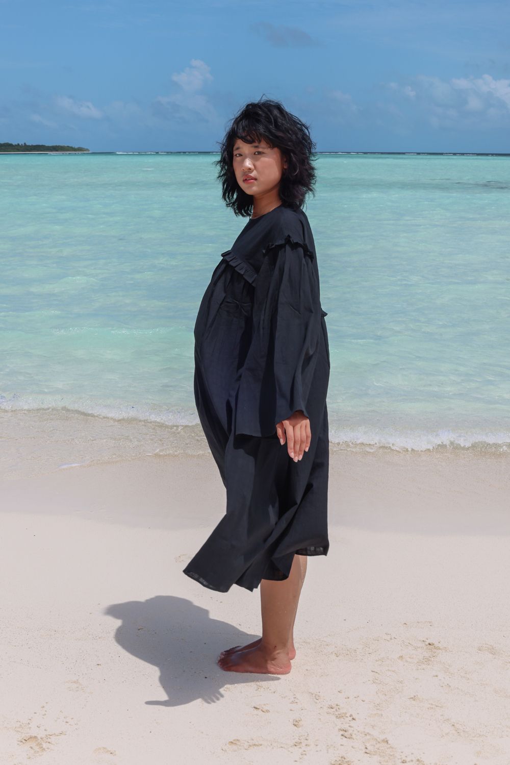 Recycled Cotton Black Solid Dress at Kamakhyaa by Raas. This item is Azo Free Dyes, Black, Cotton, Layla, Midi Dresses, Recycled, Relaxed Fit, Resort Wear, Solids, Womenswear