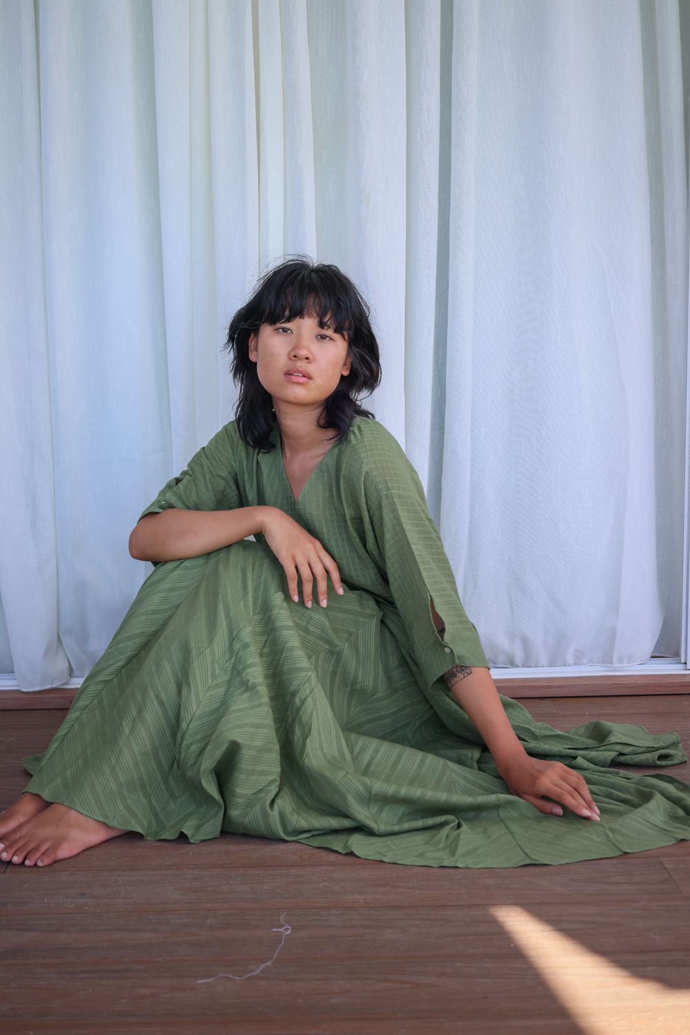 Recycled Cotton Green Solid Midi Dress at Kamakhyaa by Raas. This item is Azo Free Dyes, Casual Wear, Cotton, Green, Layla, Midi Dresses, Recycled, Relaxed Fit, Solids, Womenswear, Wrap Dresses