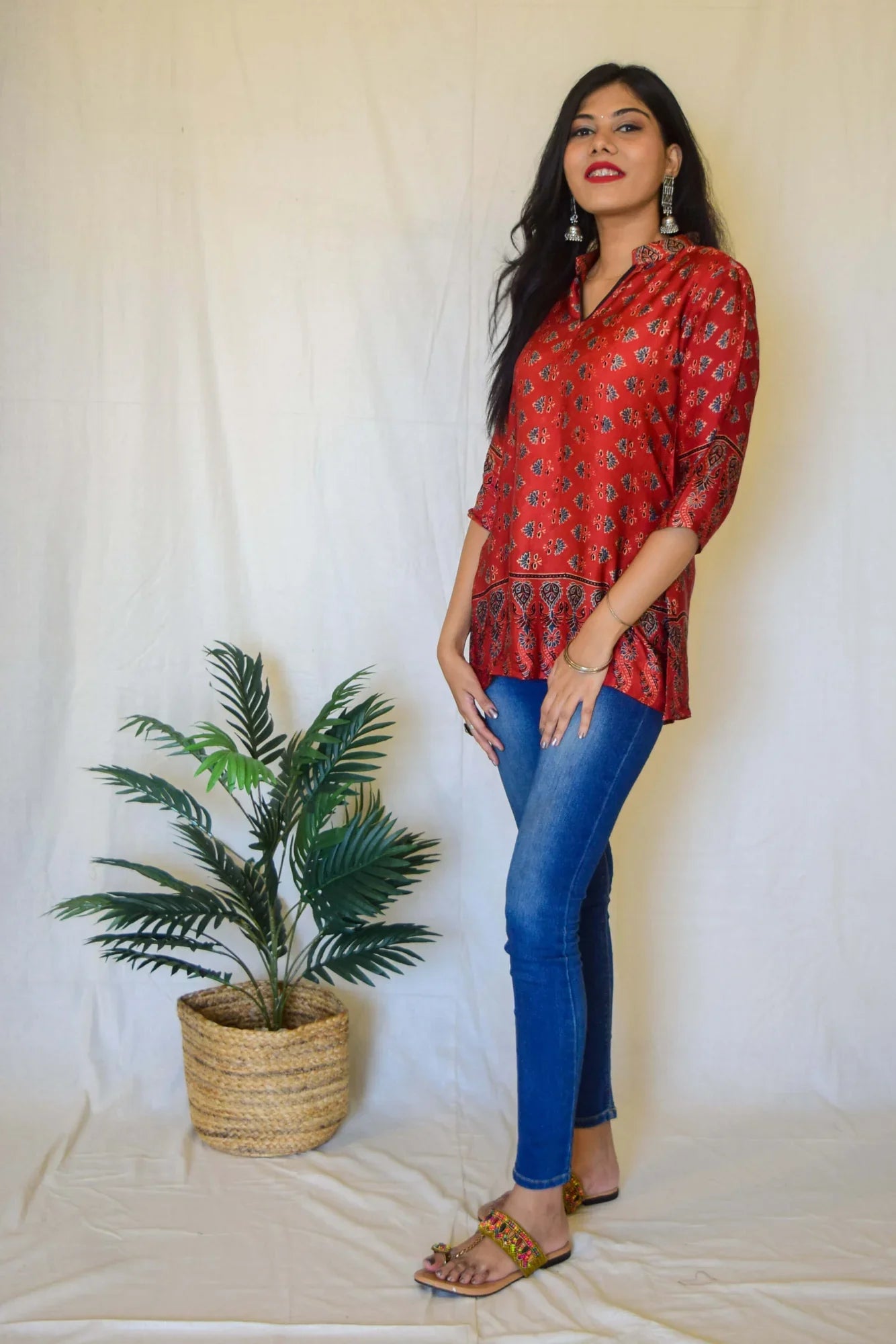 Red Ajrakh Short Kurta at Kamakhyaa by Hasttvam. This item is ModalFloralCasual WearRedHandmade by artisans, Natural dyes, Relaxed Fit, Respondible production and Vegan