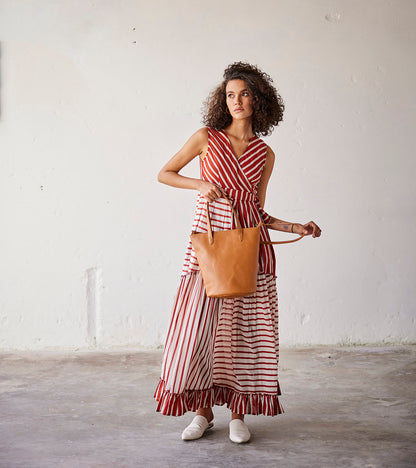 Red And Off White Stripped Mulmul Frilled Dress at Kamakhyaa by Khara Kapas. This item is An Indian Summer, Casual Wear, Dresses, Mulmul cotton, Off white, Orange, Organic, Relaxed Fit, Stripes, Womenswear