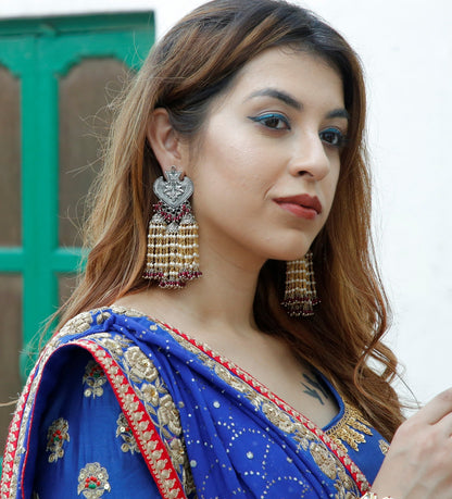 Red Jhumkas Genda Ladi at Kamakhyaa by House Of Heer. This item is Alloy Metal, Festive Jewellery, Festive Wear, Free Size, jewelry, July Sale, July Sale 2023, Long Earrings, Pearl, Red, Solids, Textured