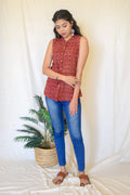 Red Kala Sleeveless Cotton Top at Kamakhyaa by Hasttvam. This item is Casual Wear, Cotton, Handmade by Artisans, Natural dyes, Red, Relaxed Fit, Respondible production and Vegan