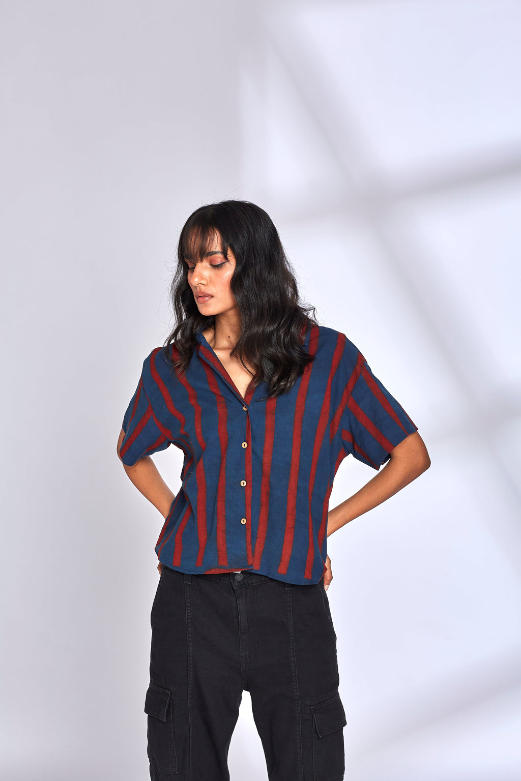 Red Striped Indigo Shirt at Kamakhyaa by Hasttvam. This item is Cotton, Fusion Wear, Handmade by Artisans, Indigo, Natural dyes, Relaxed Fit, Respondible production and Vegan, Stripes