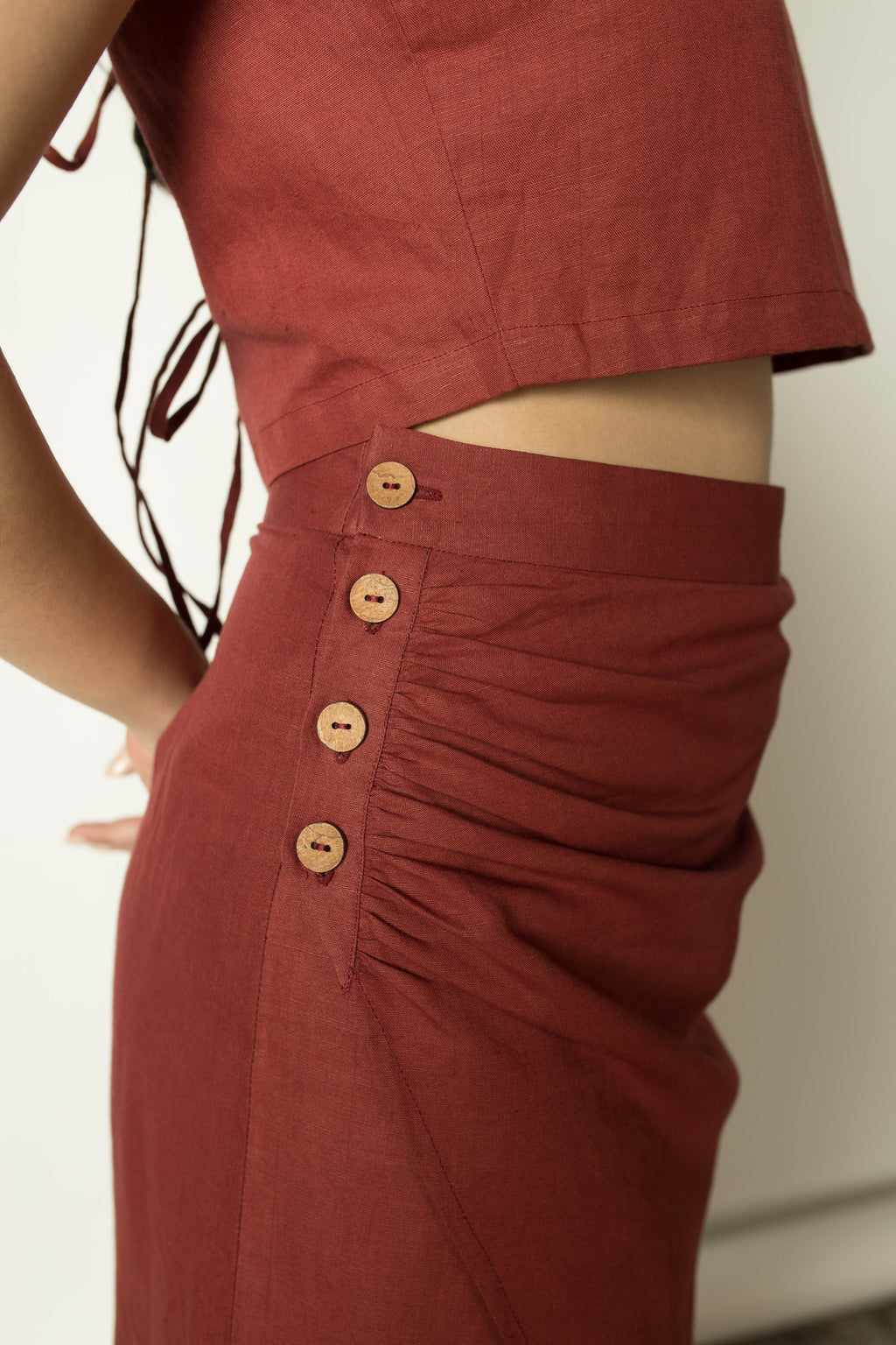 Red Wrap around Skirt with Buttons at kamakhyaa.com by Anushé Pirani. This item is Birthday Collection, Buttons, Cotton Hemp, Nostalgic Whispers by Anushe Pirani, Office Formals, Red, Review September 2025, Skirts, Slim Fit, Womenswear
