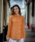 Rust Wrap Handwoven Shirt at Kamakhyaa by Krushnachuda. This item is Chilika by Krushnachuda, Handloom Cotton, Loose Fit, Natural Dye, Organic, Outerwear, Rustic Orange, Solids, Under $100, Womenswear