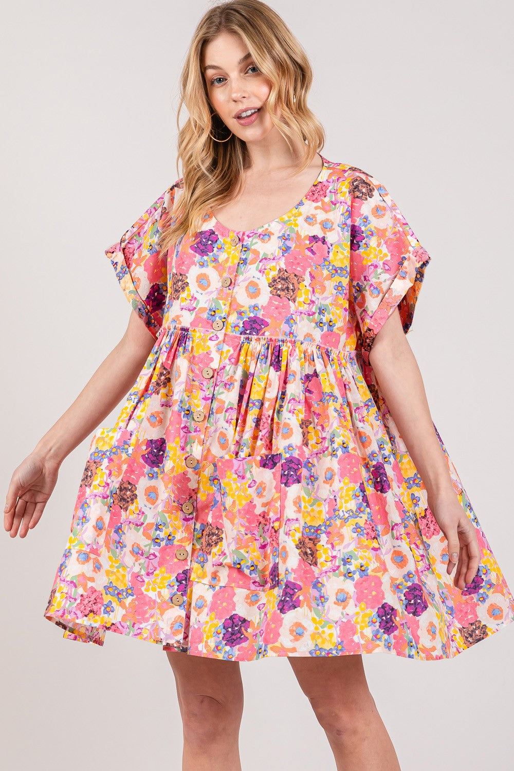 SAGE + FIG Floral Short Sleeve Babydoll Dress with Pockets at Kamakhyaa by Trendsi. This item is SAGE+FIG, Ship from USA, Trendsi