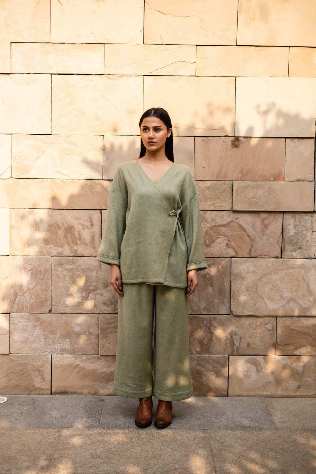 Sap Green Merino Wool Pansy Top at Kamakhyaa by Raas. This item is Green, Merino Wool, Regular Fit, Tunic Tops, Uru by Raas, Winter Wear, Woven