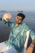 Seabreeze Button-Up at Kamakhyaa by anushé pirani. This item is Blue, Cotton, Green, Men Shirts, Menswear, Moana, Recycled Cotton, Resort Wear, Shibori Dyes, Under $150