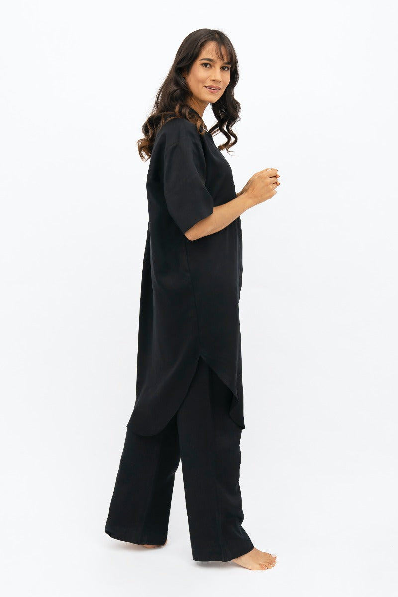 Seville - Midi Dress - Licorice at Kamakhyaa by 1 People. This item is Made from Natural Materials