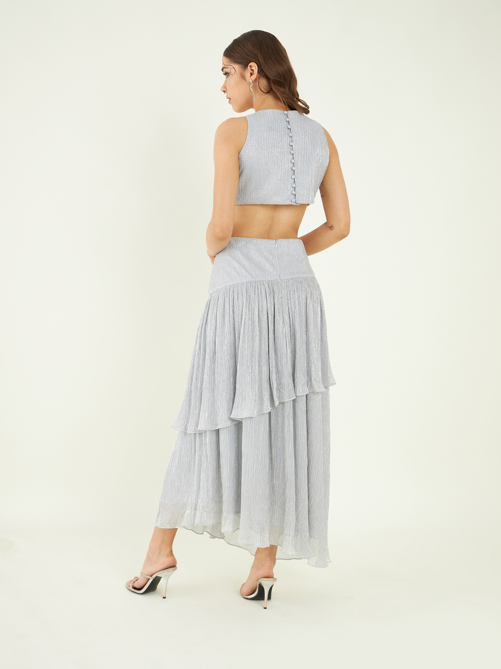Silver Party Wear Tiered Dress at Kamakhyaa by Bohobi. This item is Fine Pleated Crepe, Party Wear, Regular Fit, Silver, Sleeveless Dresses, Swarovski Embroidery, Toxin free