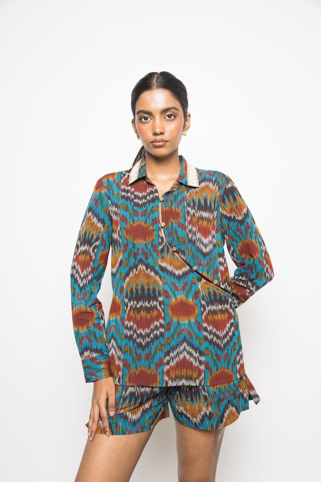 Slouchy Pleated Shorts at kamakhyaa.com by Anushé Pirani. This item is 100% Cotton, Beach Wear, Casual Wear, Console Collection List, Cotton, Fresh Ink by Anushe Pirani, Handwoven cotton, Ikat Prints, Regular Fit, Shorts, Turquoise, Vacation Wear, Womenswear